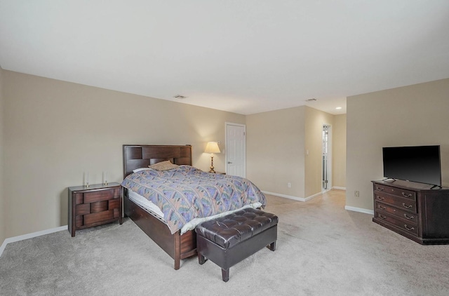 bedroom with light carpet