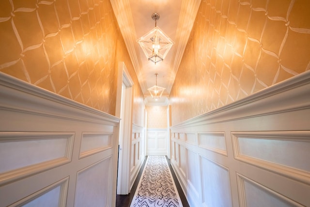 hallway featuring crown molding