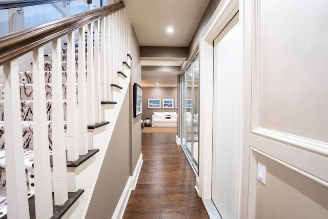 hall with dark hardwood / wood-style flooring