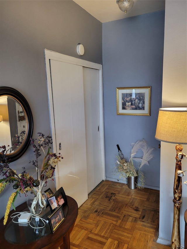 entrance foyer with dark parquet flooring