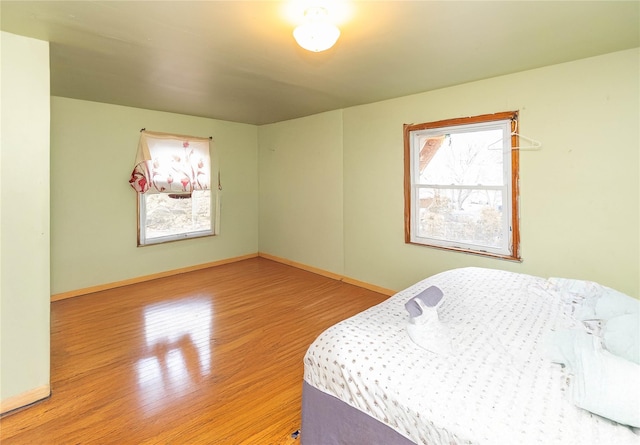 bedroom featuring hardwood / wood-style floors