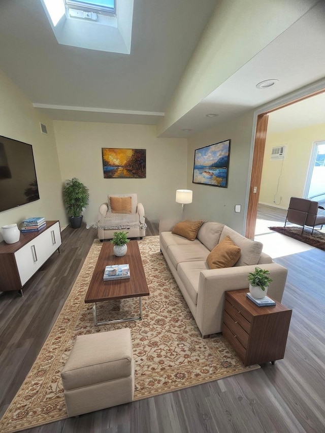 living room featuring dark hardwood / wood-style floors and lofted ceiling with skylight