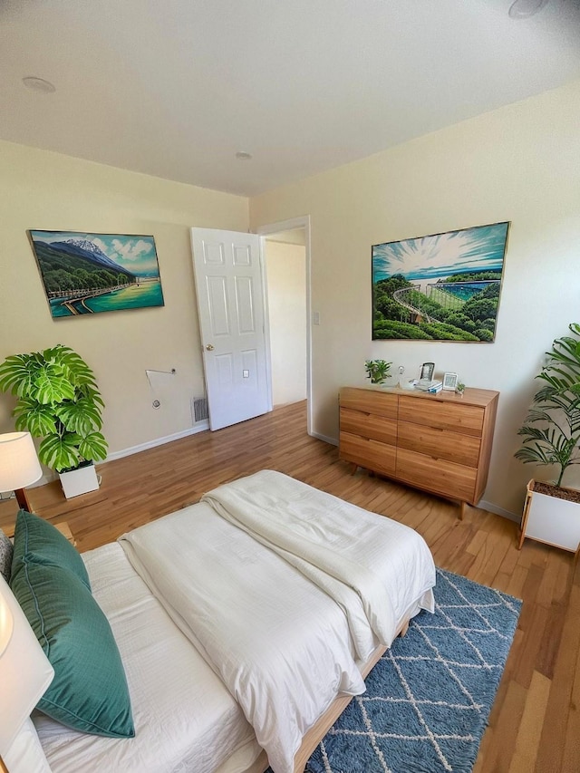 bedroom featuring hardwood / wood-style flooring