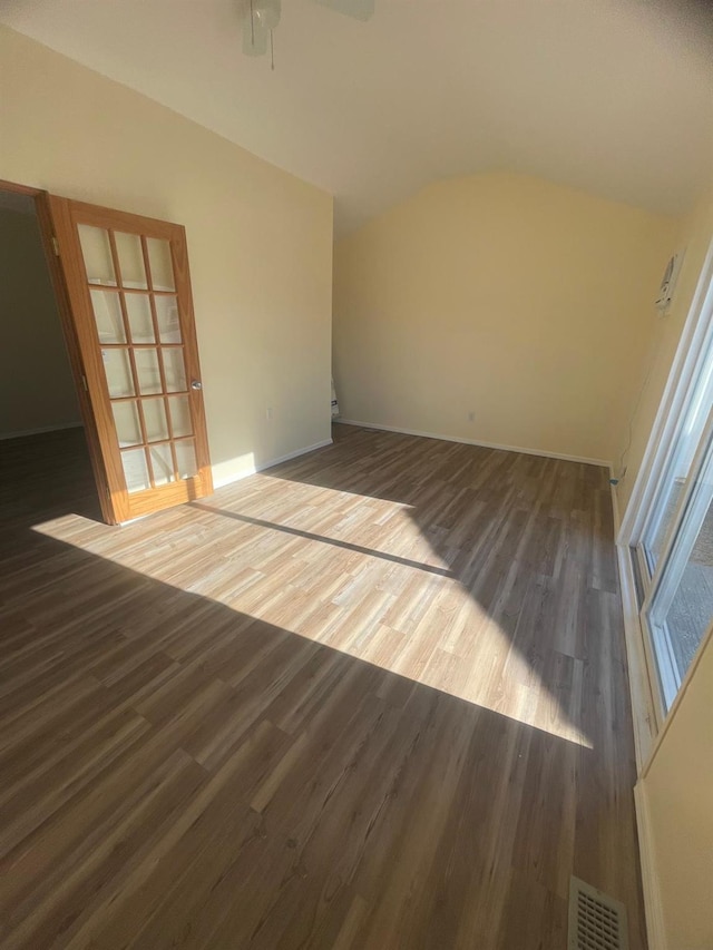 spare room with hardwood / wood-style floors and ceiling fan