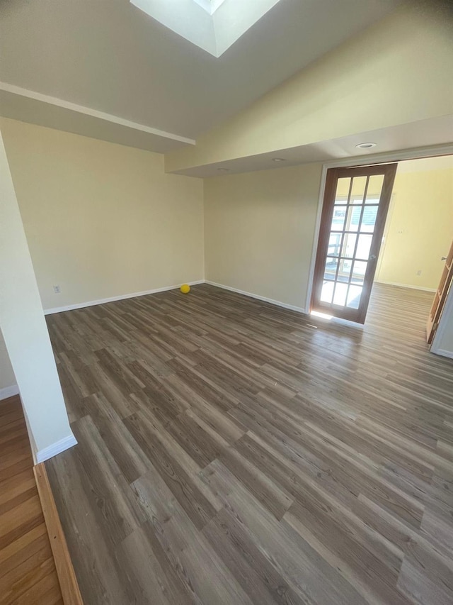 unfurnished room with dark wood-type flooring