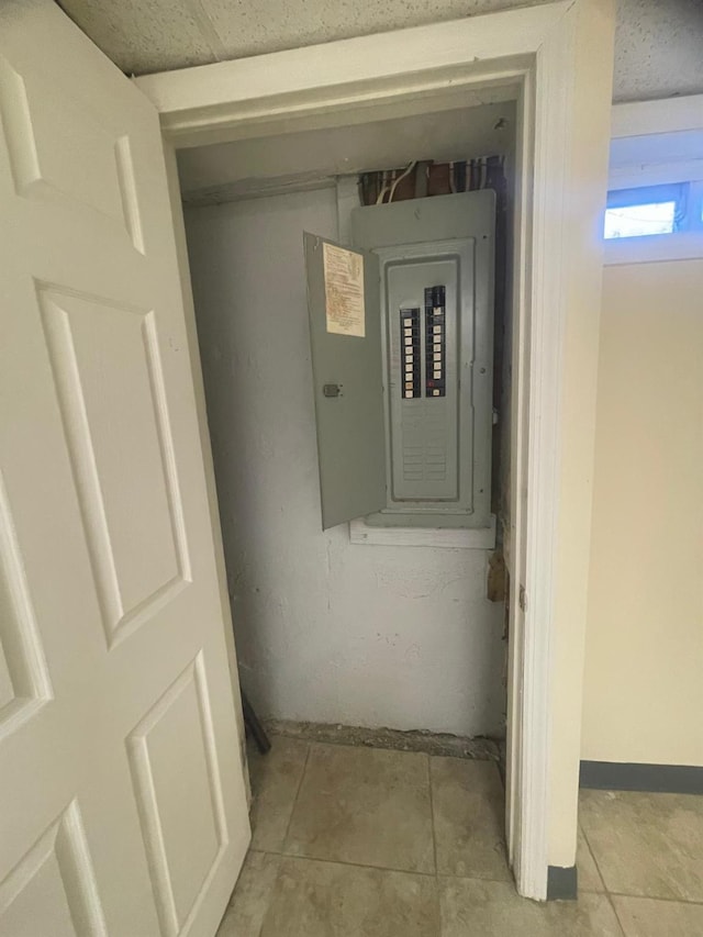 utility room featuring electric panel