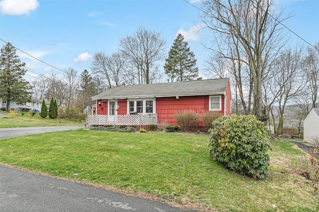 view of front of home with a front yard