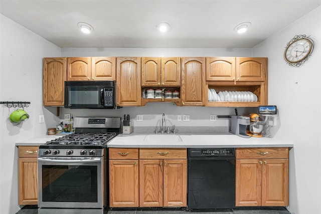 kitchen featuring black appliances and sink