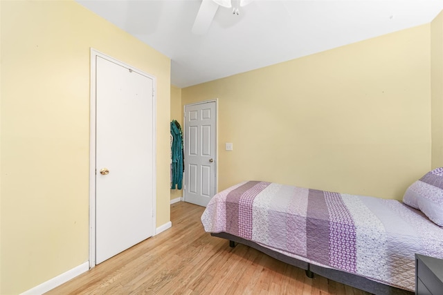 bedroom featuring ceiling fan and light hardwood / wood-style flooring