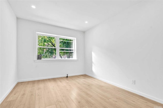 empty room featuring light hardwood / wood-style floors