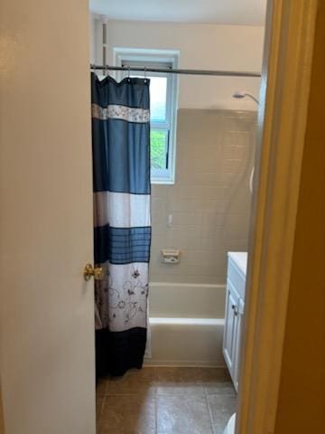 bathroom with tile patterned floors, vanity, and shower / bath combination with curtain
