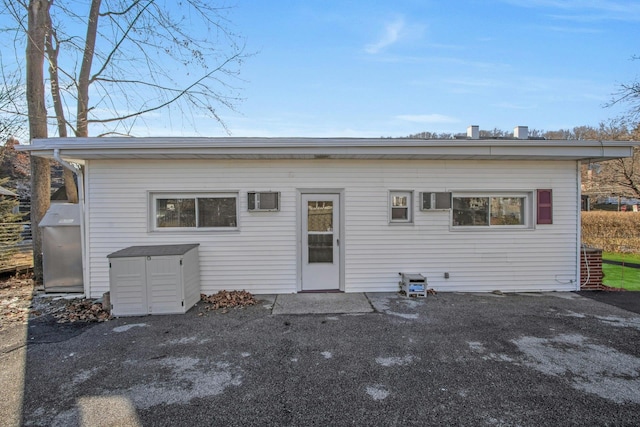 back of house with a patio