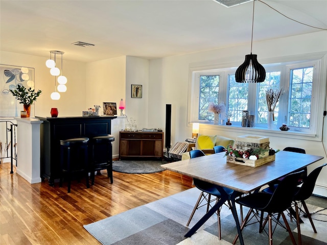 dining room featuring wood-type flooring