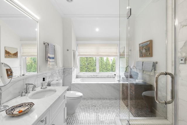 full bathroom featuring toilet, vanity, independent shower and bath, tile walls, and ornamental molding