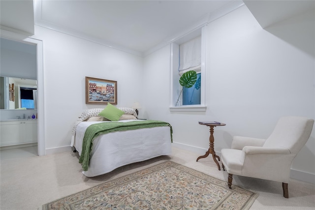 carpeted bedroom featuring ornamental molding