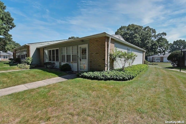 view of front of house with a front yard