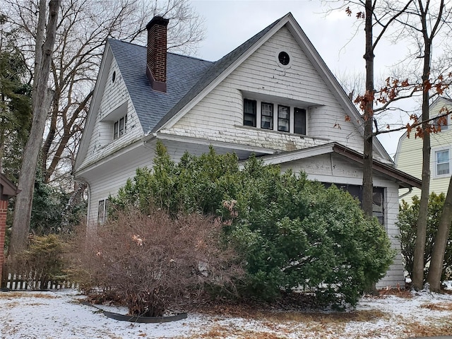 view of snow covered property