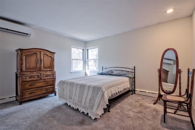 carpeted bedroom with baseboard heating and a wall mounted air conditioner