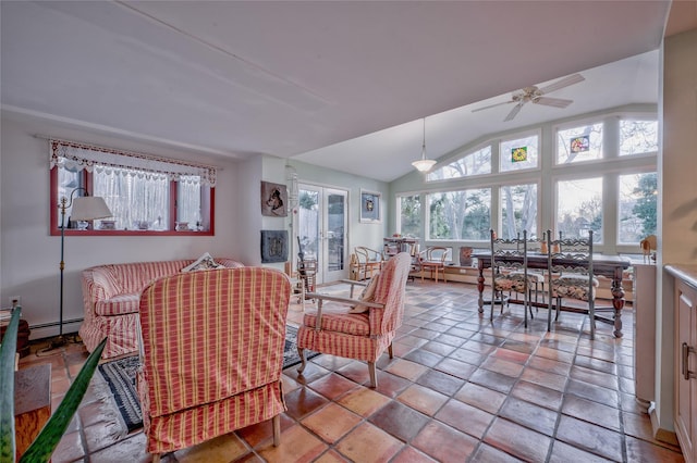 dining room with ceiling fan, a baseboard radiator, lofted ceiling, and french doors