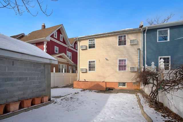 view of snow covered house