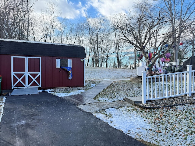 exterior space featuring a storage shed