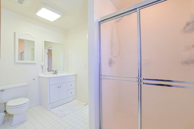 bathroom with tile patterned flooring, vanity, an enclosed shower, and toilet