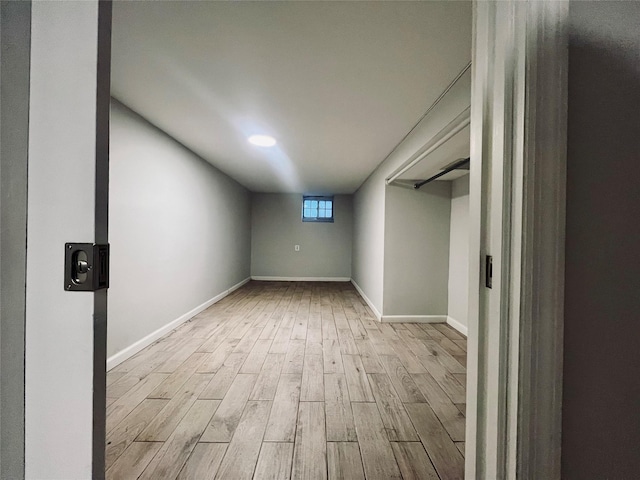 basement featuring light wood-type flooring