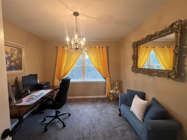 home office featuring an inviting chandelier, carpet flooring, and plenty of natural light