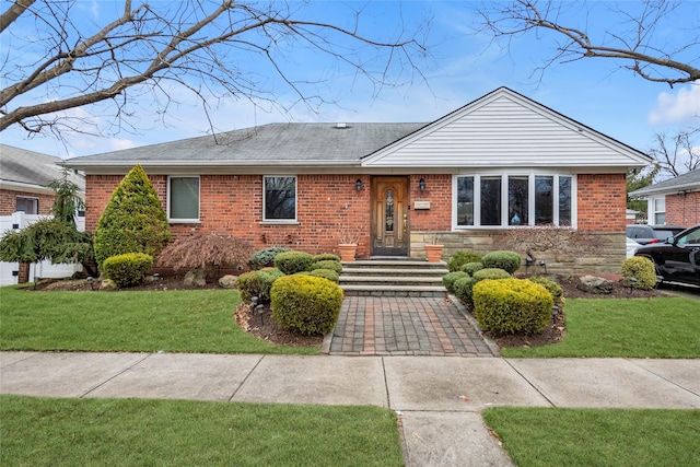 ranch-style house with a front yard