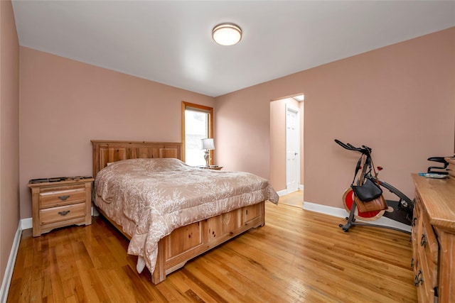 bedroom with light hardwood / wood-style floors