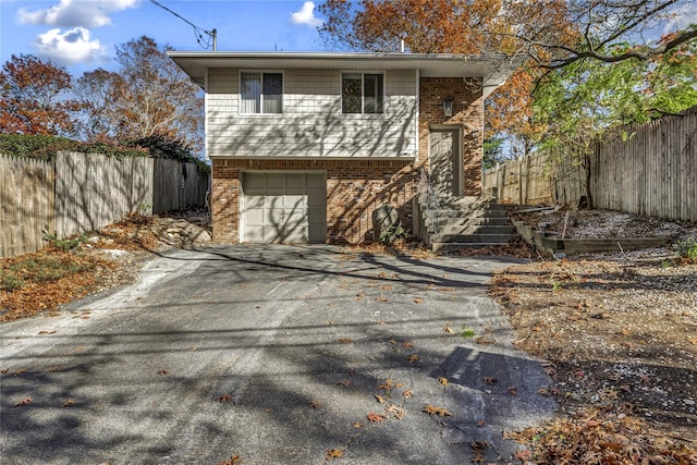 view of front of home with a garage