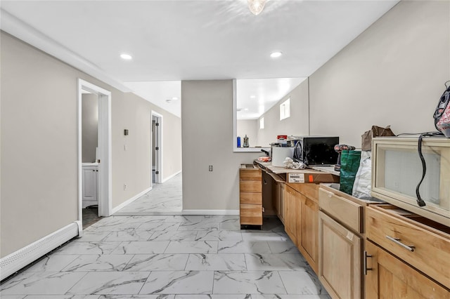 kitchen featuring a baseboard heating unit