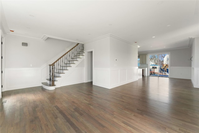 unfurnished living room with dark hardwood / wood-style floors and ornamental molding