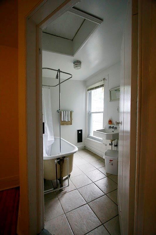 bathroom featuring tile patterned floors and walk in shower