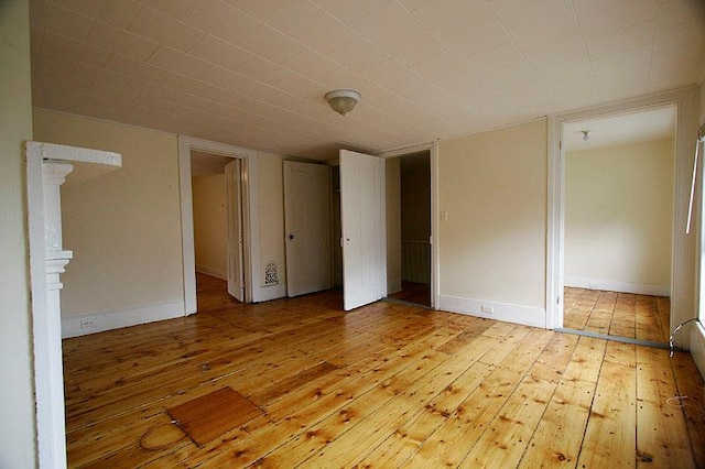 unfurnished bedroom featuring light hardwood / wood-style floors