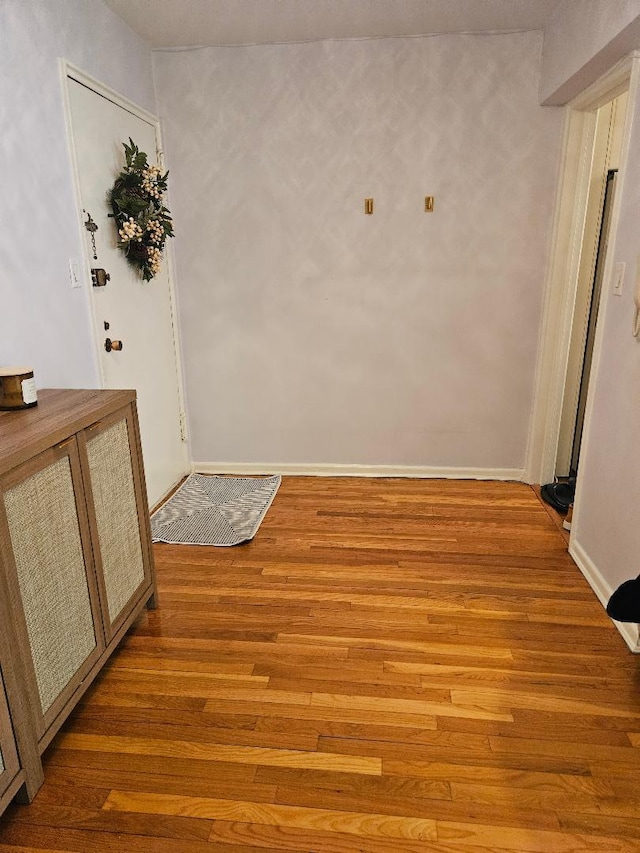 hall featuring hardwood / wood-style floors