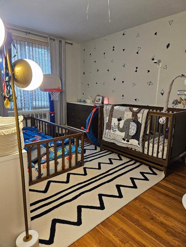 bedroom featuring hardwood / wood-style floors