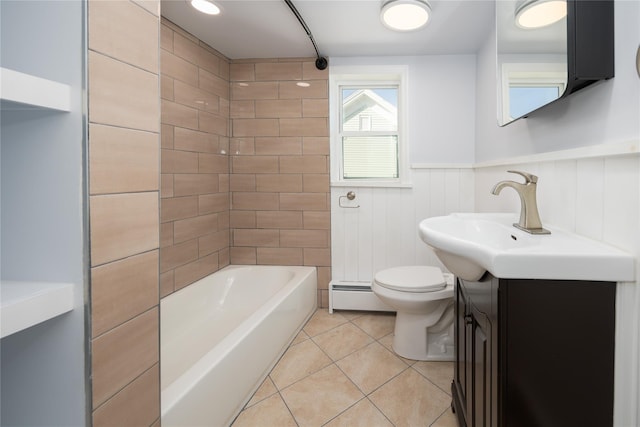 full bathroom featuring toilet, tiled shower / bath, vanity, tile patterned flooring, and a baseboard heating unit