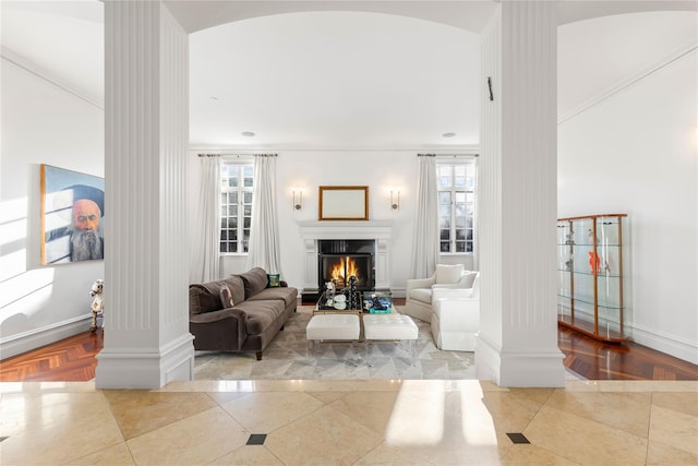 living room with ornate columns