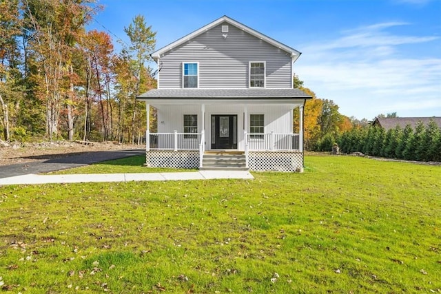 view of front property with covered porch and a front lawn