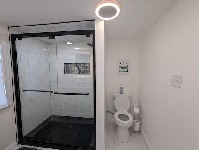 bathroom with toilet and walk in shower