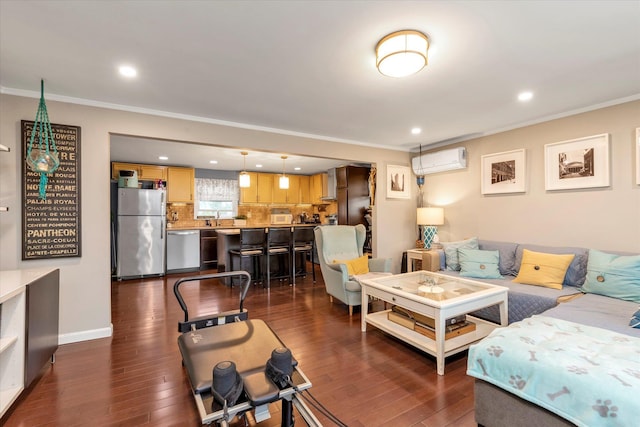 living room with dark hardwood / wood-style floors, a wall mounted AC, and ornamental molding