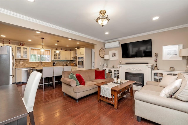 living room with a wall mounted air conditioner, dark hardwood / wood-style floors, and crown molding