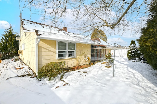 view of snow covered property