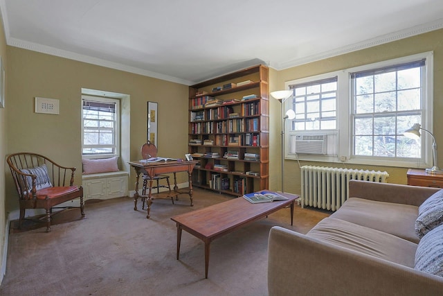 living area with carpet floors, ornamental molding, radiator, and cooling unit