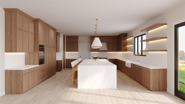 kitchen featuring decorative light fixtures, a center island, light countertops, open shelves, and backsplash