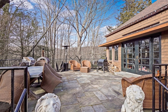 view of patio featuring area for grilling and french doors