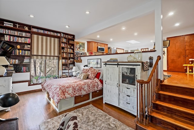 bedroom featuring wood-type flooring