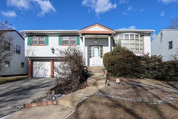 view of front of house with a garage