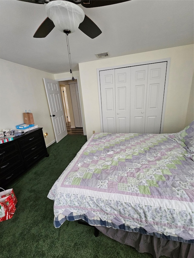 carpeted bedroom with ceiling fan and a closet